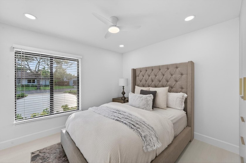 Exquisitely reimagined, this stunning 3-bedroom, 2-bath - photo 32
