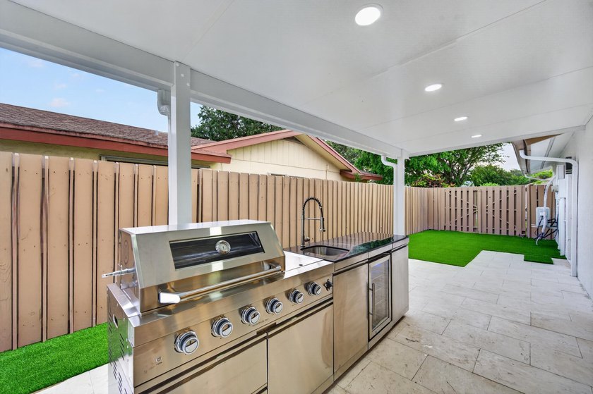 Exquisitely reimagined, this stunning 3-bedroom, 2-bath - photo 35