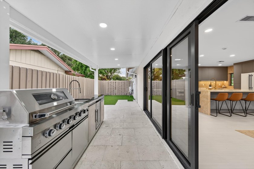 Exquisitely reimagined, this stunning 3-bedroom, 2-bath - photo 36