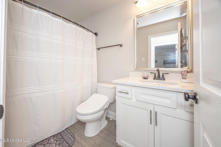 WELCOME TO YOUR DREAM HOME IN OCEAN SPRINGS, MISSISSIPPI! This - photo 58