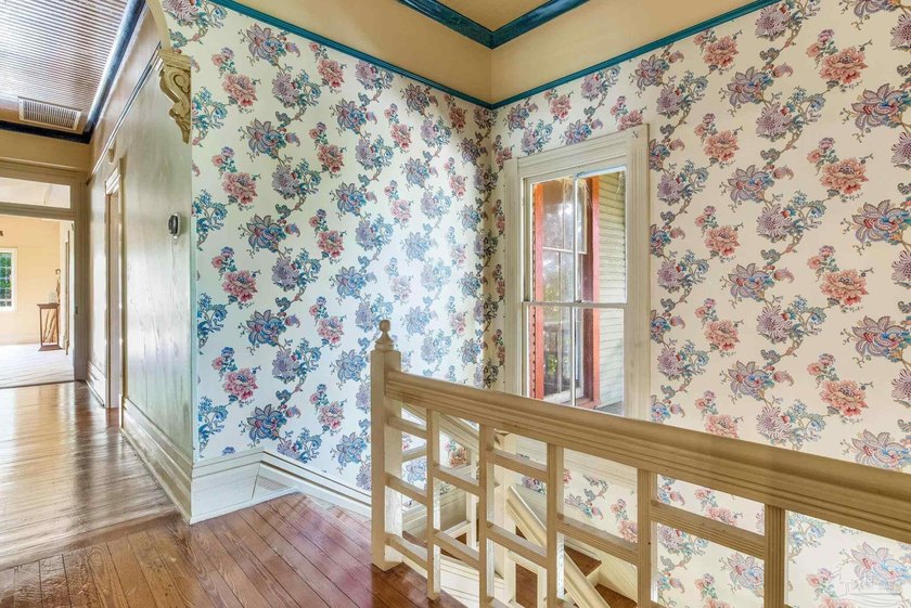 Welcome to 1017 N Palafox Street, a timeless Queen Anne - photo 5
