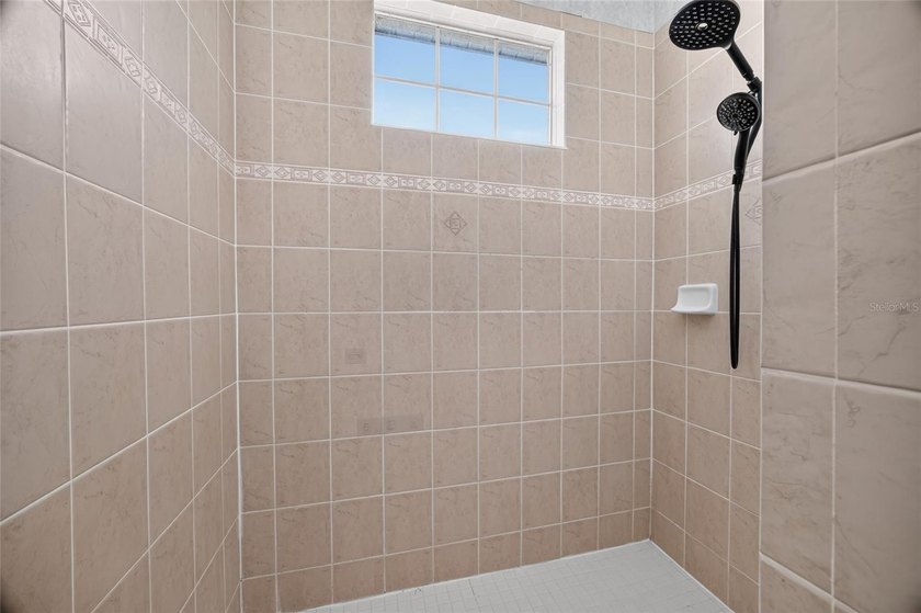 Located in the highly sought-after Candler Hills neighborhood of - photo 22