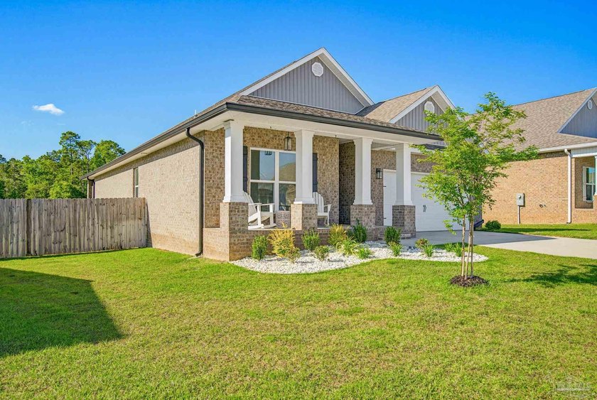 This stunning 4-bedroom, 2-bath home offers like-new - photo 3