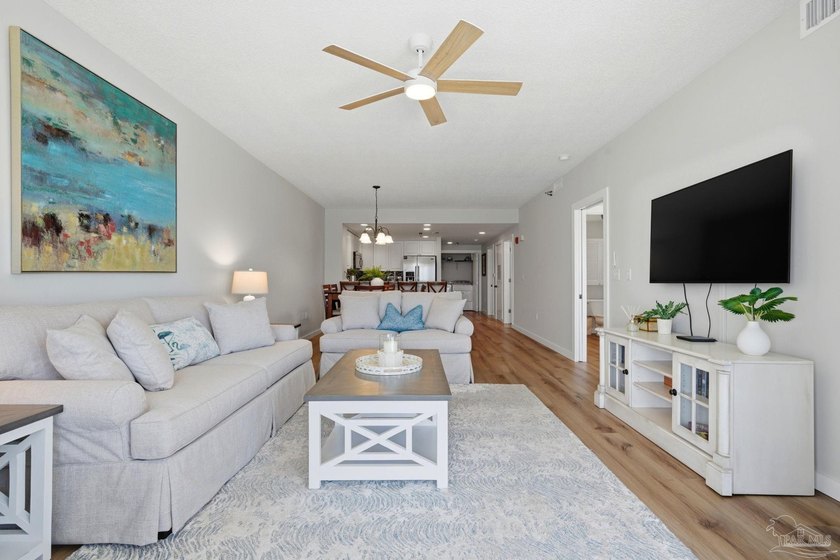 Perched on the 16th floor of Emerald Isle, this beautifully - photo 3