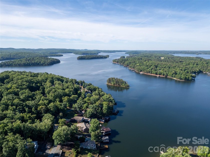 Tucked away along the peaceful shores of Badin Lake, this - photo 10