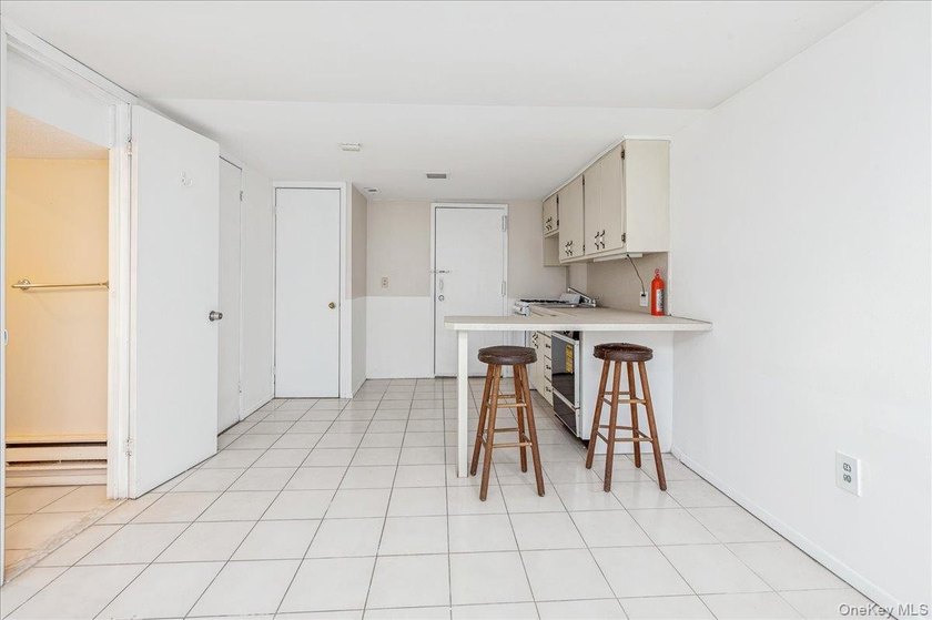 Welcome to 2125 Homer Avenue, a well maintained two-family brick - photo 13