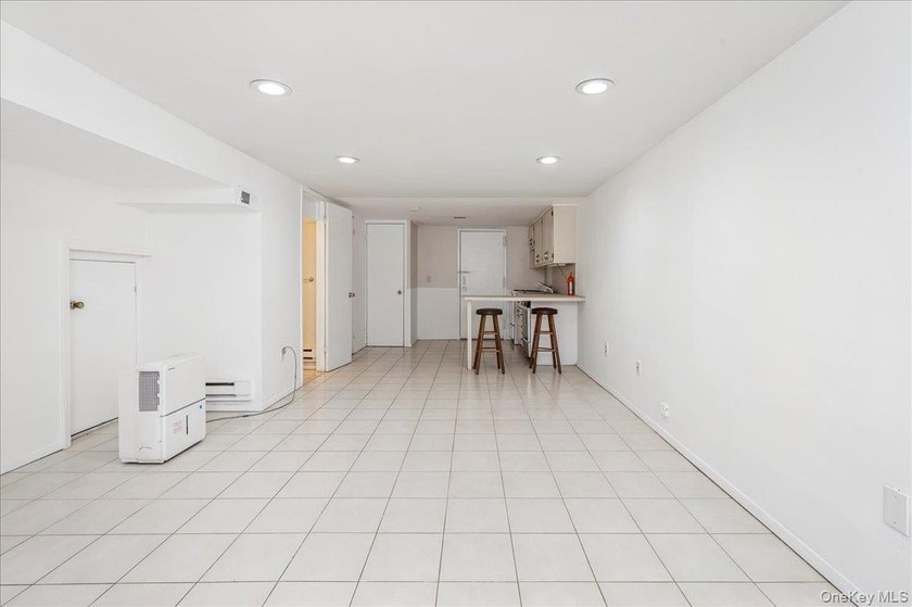 Welcome to 2125 Homer Avenue, a well maintained two-family brick - photo 14