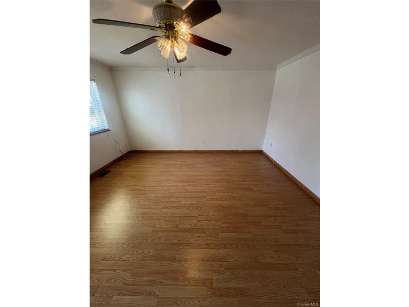 Located on a peaceful, tree-lined street in the Brownville - photo 4
