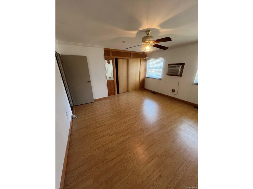 Located on a peaceful, tree-lined street in the Brownville - photo 5