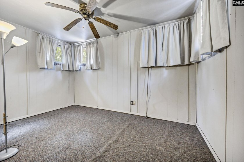 A long, private, tree-lined drive leads to a brick cabin - photo 20