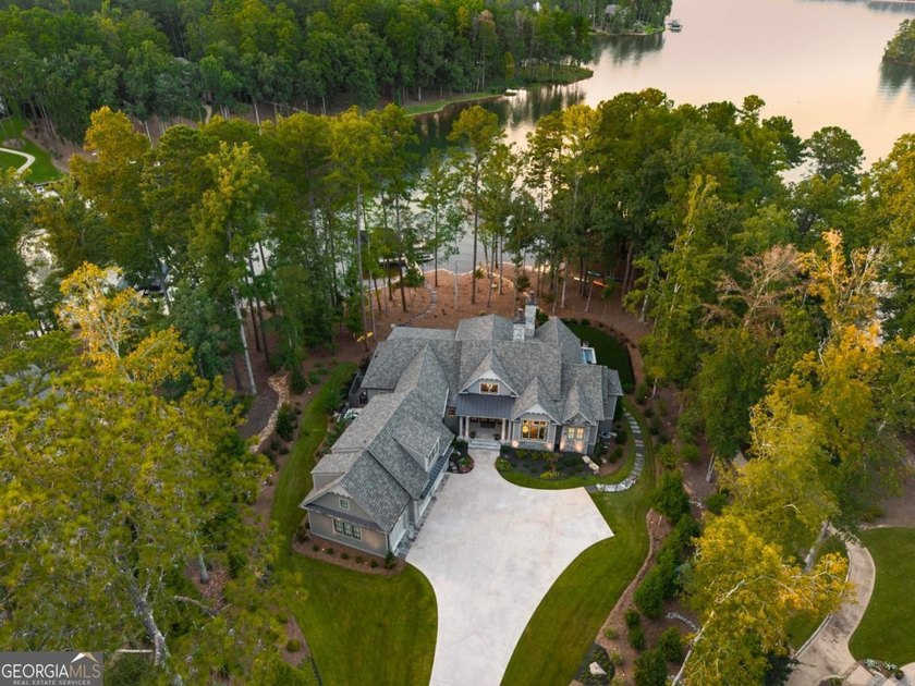 LAKEFRONT BUILDER'S PERSONAL HOME IN REYNOLDS LAKE OCONEE where - photo 3