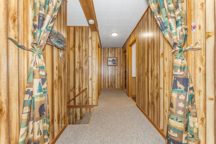 Northwoods home with western exposure and 100' of sand frontage - photo 12