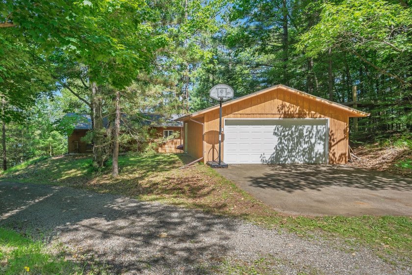 Northwoods home with western exposure and 100' of sand frontage - photo 17