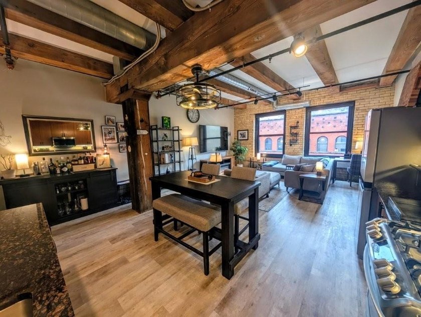 This beautifully maintained, open-concept condo/loft at River - photo 7