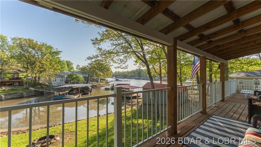 This Cape Cod cottage offers the quintessential lake escape - photo 16
