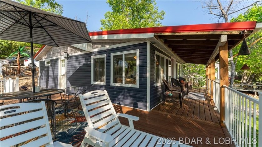 This Cape Cod cottage offers the quintessential lake escape - photo 18