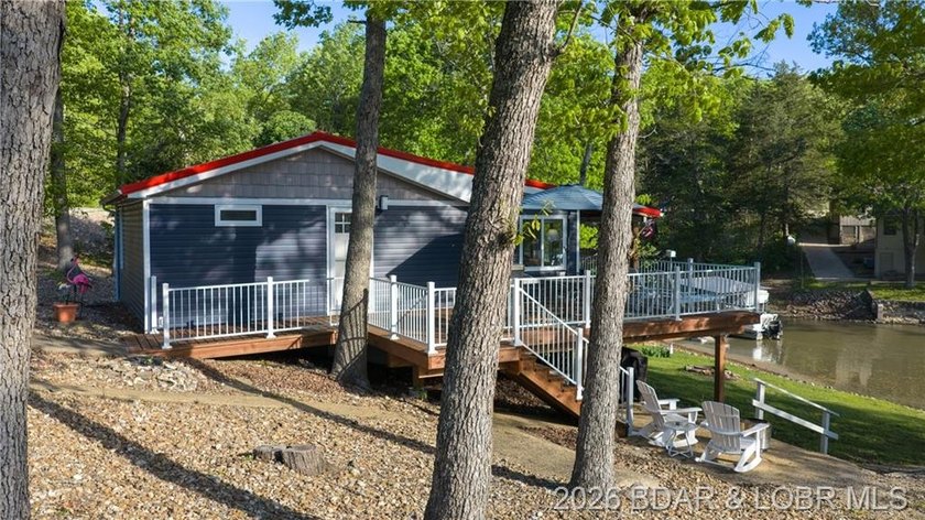 This Cape Cod cottage offers the quintessential lake escape - photo 24