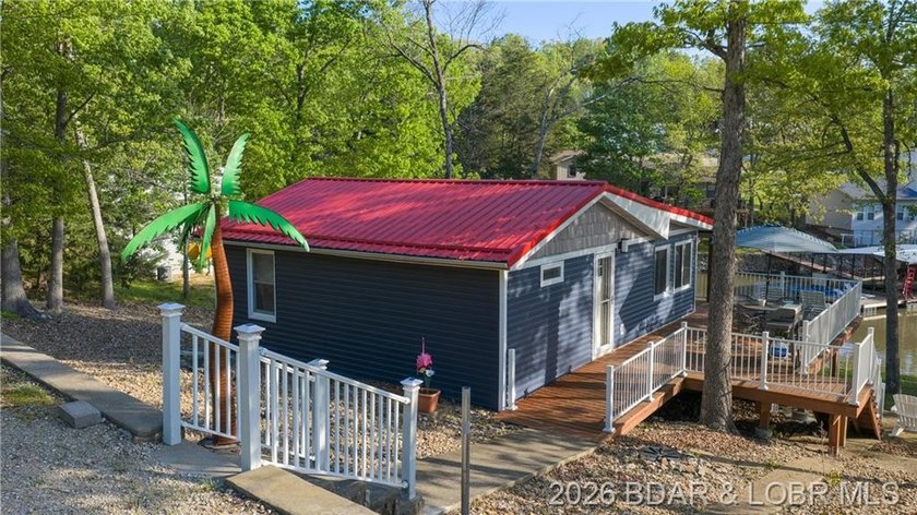 This Cape Cod cottage offers the quintessential lake escape - photo 25