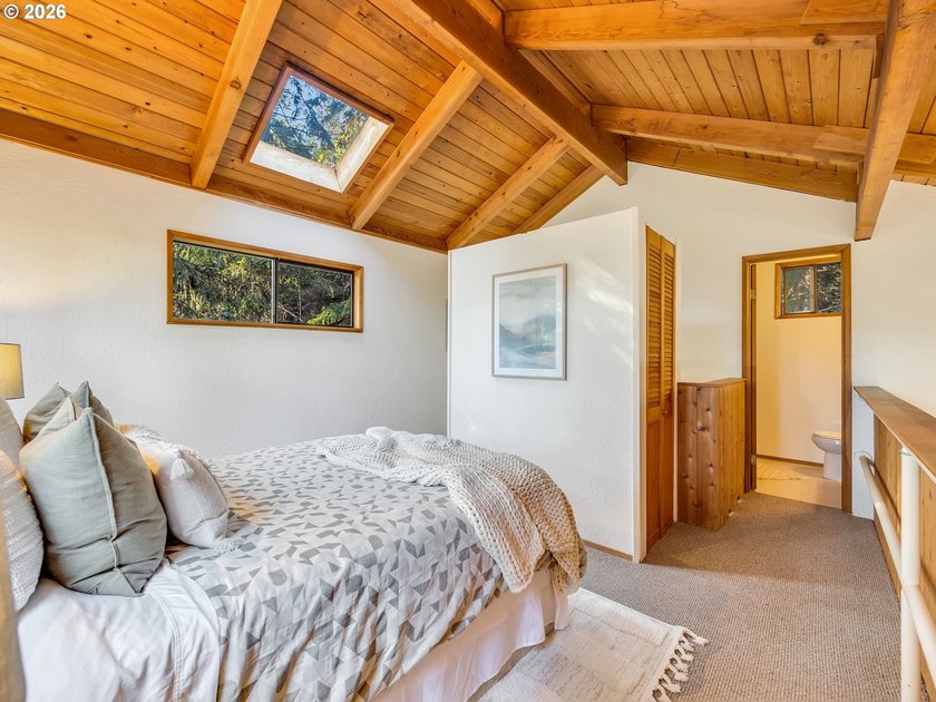 Escape to this treehouse-like retreat tucked safely high on a - photo 18