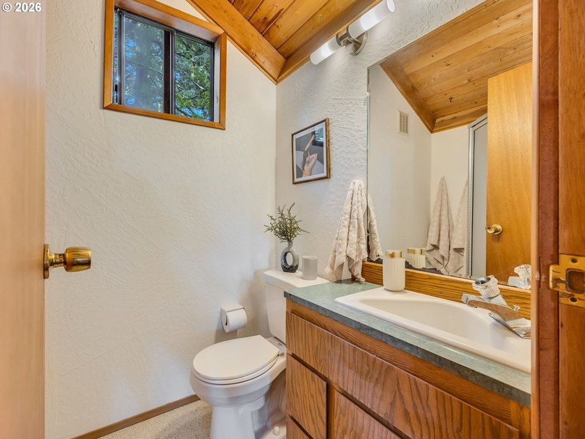 Escape to this treehouse-like retreat tucked safely high on a - photo 19