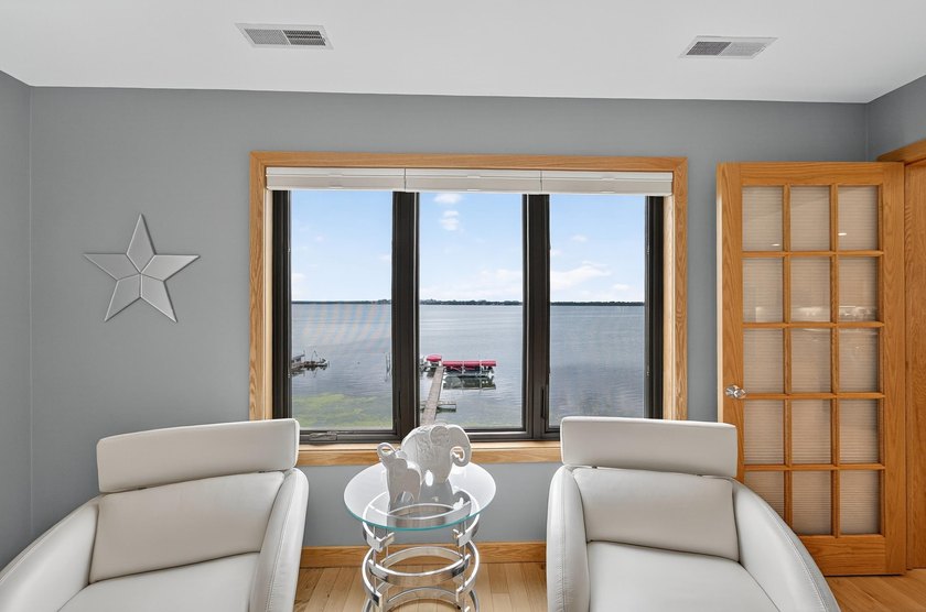 Experience breathtaking 180-degree views of Lake Monona and the - photo 23