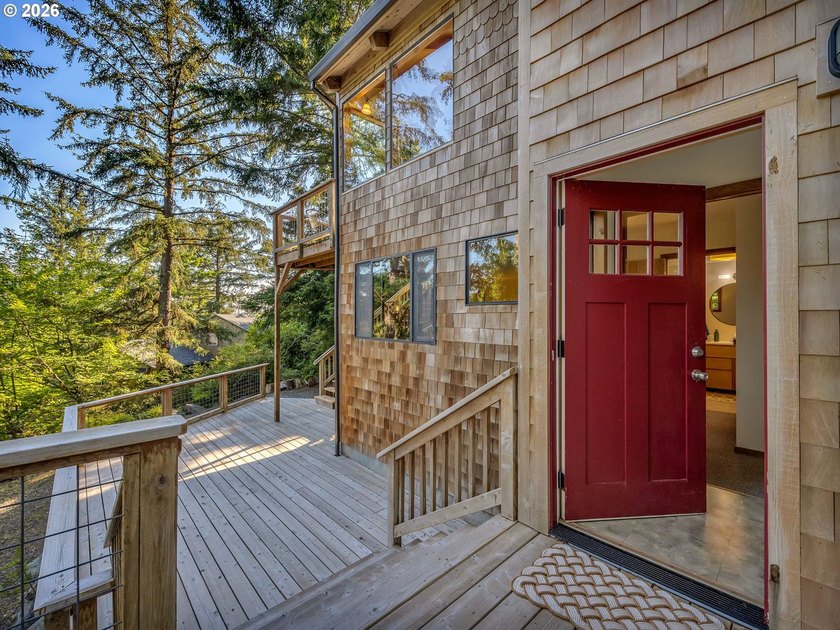 Escape to this treehouse-like retreat tucked safely high on a - photo 34