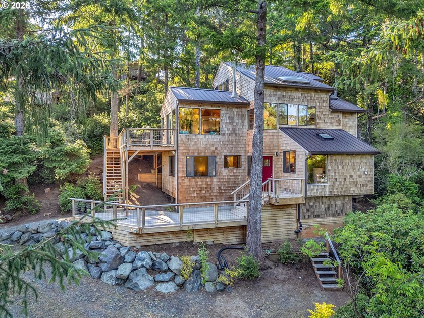 Escape to this treehouse-like retreat tucked safely high on a - photo 36