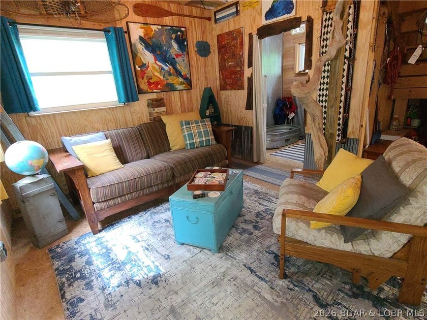 Featuring five acres of wooded privacy and a rustic cabin. Enjoy - photo 3