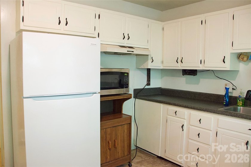 Back on the Market!! This cute and cozy compact condo packs a - photo 6