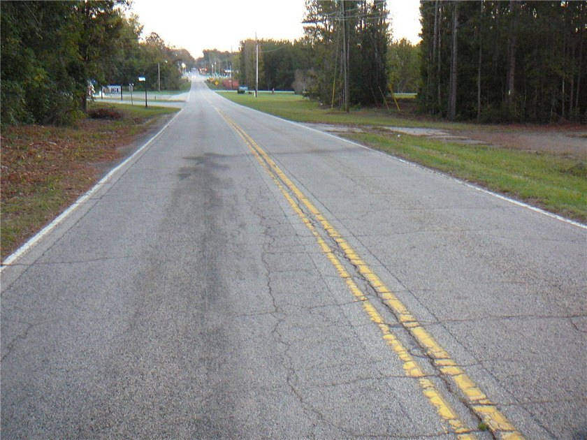 4+ Acres, cleared and level. Water and Sewer available. Located - photo 5