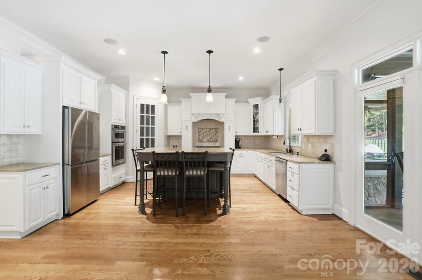 Welcome to 105 Quincy Court, a stunning custom home located in - photo 8