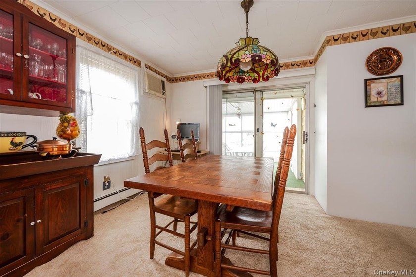 Welcome to this Charming Colonial in the heart of Bellmore. This - photo 5