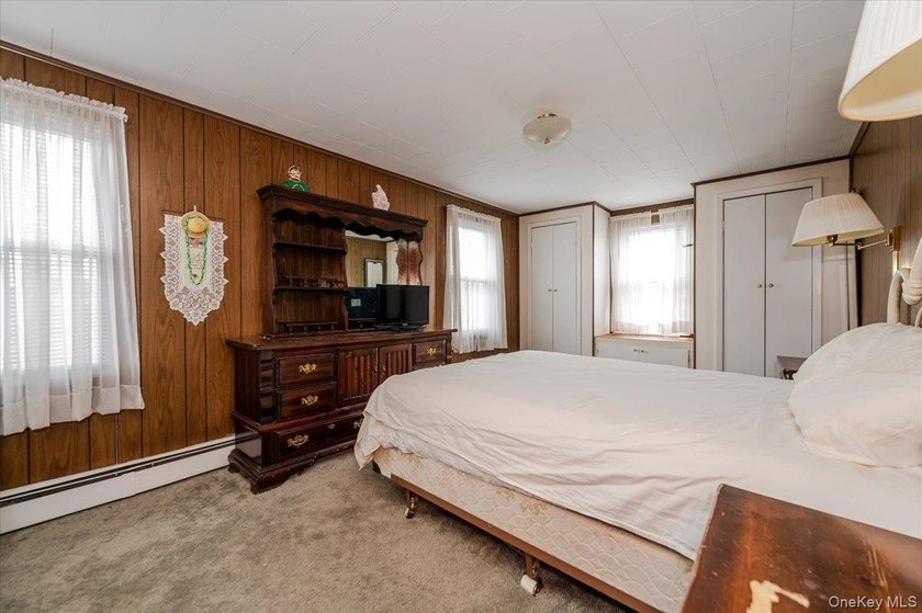 Welcome to this Charming Colonial in the heart of Bellmore. This - photo 8