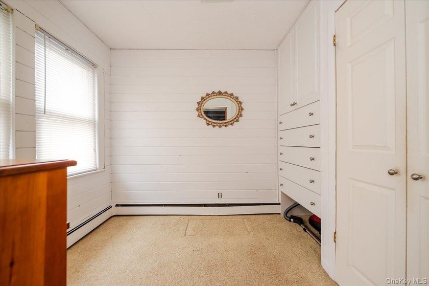 Welcome to this Charming Colonial in the heart of Bellmore. This - photo 9