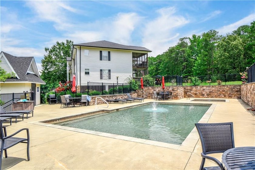 This inviting 2 bedroom, 2 bath condo is located inside the - photo 5