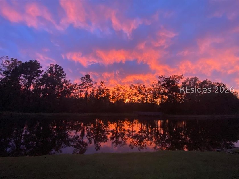 Tucked into a serene waterfront setting where towering trees - photo 50