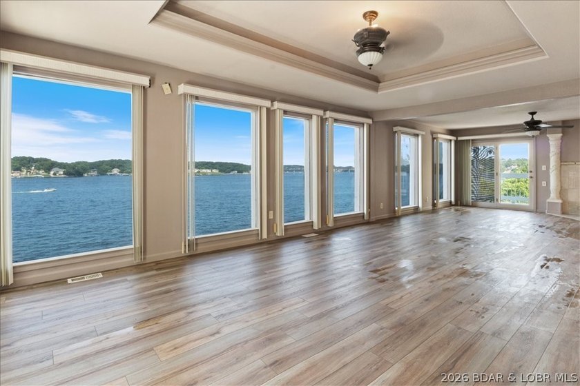 Perched above the shimmering waters of the Lake of the Ozarks - photo 20