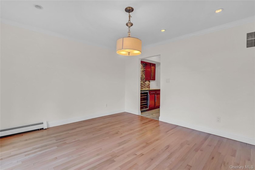 Set on nearly an acre in the heart of Miller Place, this - photo 4