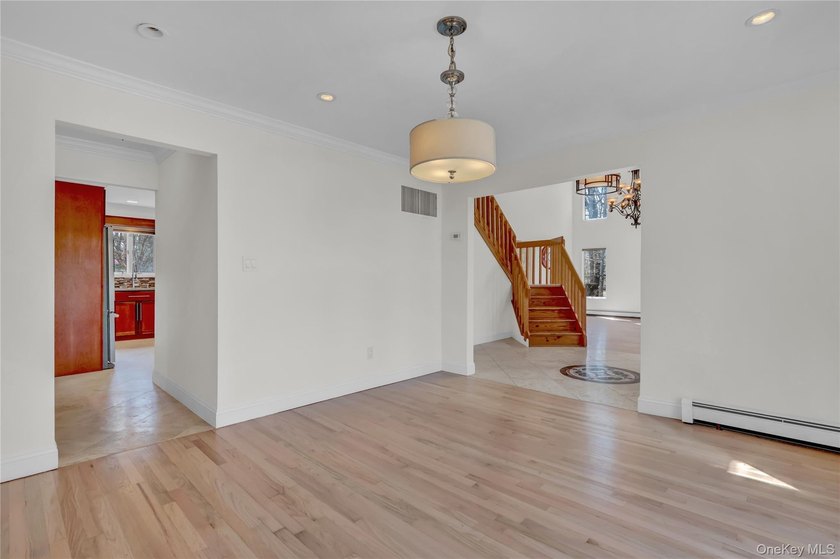 Set on nearly an acre in the heart of Miller Place, this - photo 5