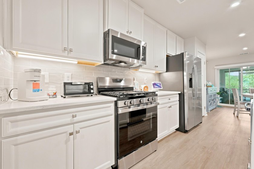 Experience coastal luxury at its finest within this Turn-key - photo 13