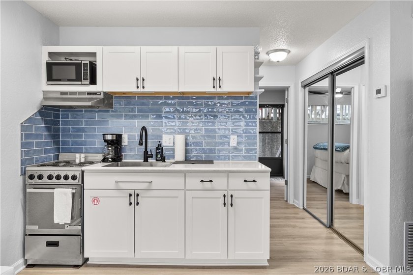 MAKE AN OFFER! Lakefront, professionally remodeled, and priced - photo 16