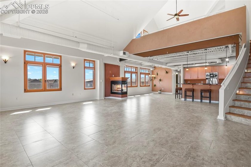 This rare penthouse corner residence in Poet Lofts, offers an - photo 42