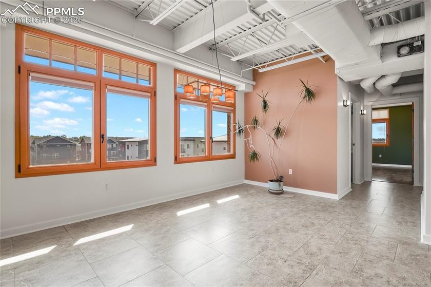 This rare penthouse corner residence in Poet Lofts, offers an - photo 43