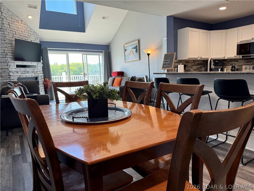 Lake life just got a serious glow-up! This beautifully remodeled - photo 12