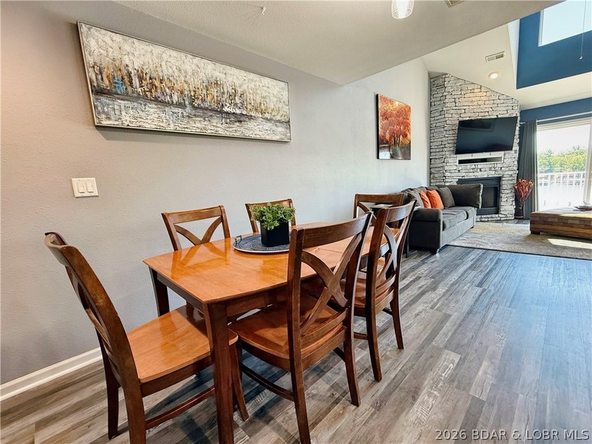 Lake life just got a serious glow-up! This beautifully remodeled - photo 16