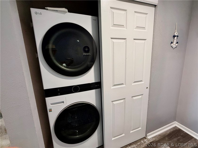 Lake life just got a serious glow-up! This beautifully remodeled - photo 24