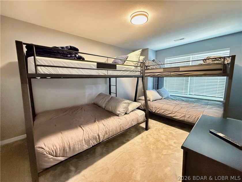 Lake life just got a serious glow-up! This beautifully remodeled - photo 40