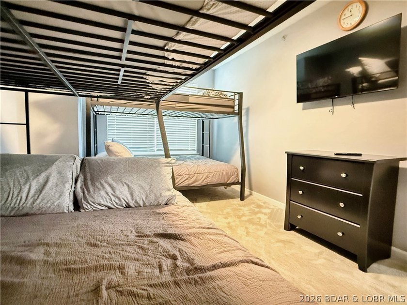 Lake life just got a serious glow-up! This beautifully remodeled - photo 41
