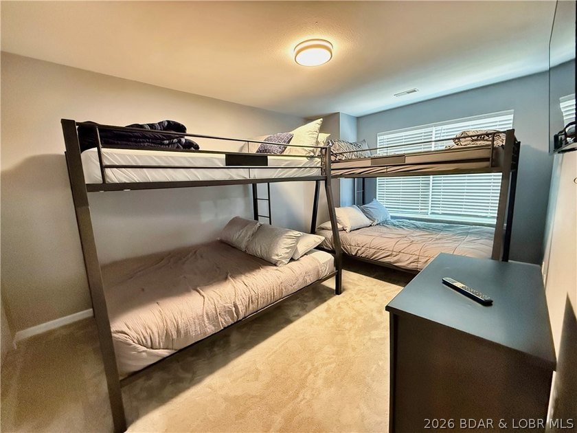 Lake life just got a serious glow-up! This beautifully remodeled - photo 42
