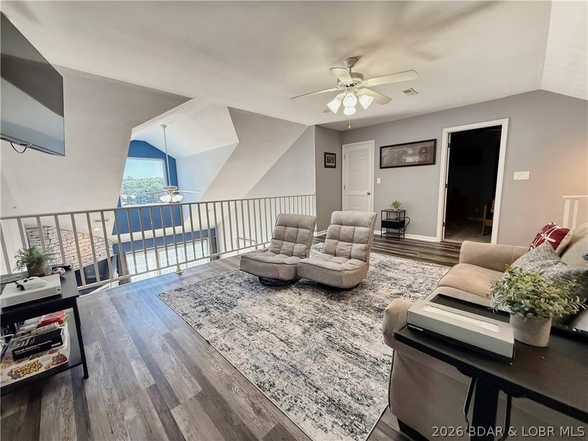 Lake life just got a serious glow-up! This beautifully remodeled - photo 46